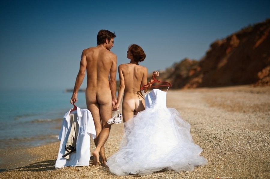 A pair of newlyweds on the beach